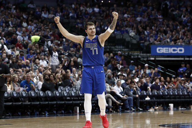 Dallas Mavericks' Luka Doncic celebrates during an NBA basketball game against the Sacramento Kings in Dallas, Tuesday, March 26, 2019. (AP Photo/Tony Gutierrez)