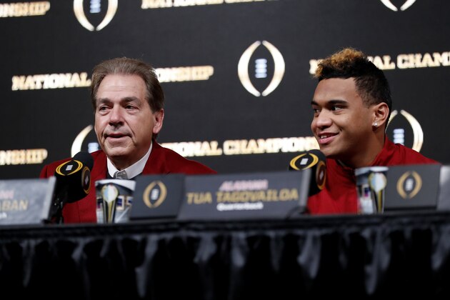 Alabama head coach Nick Saban, left, speaks next to quarterback Tua Tagovailoa during a press conference in Atlanta, Tuesday, Jan. 9, 2018. Alabama beat Georgia in overtime to win the NCAA college football playoff championship game. (AP Photo/David Goldman)