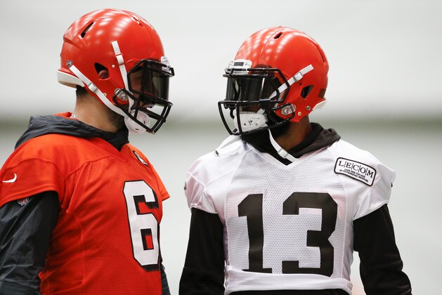 Cleveland Browns quarterback Baker Mayfield (6) talks with Odell Beckham Jr (13) during practice at the team's NFL football training facility in Berea, Ohio, Thursday, June 6, 2019. (AP Photo/Ron Schwane)