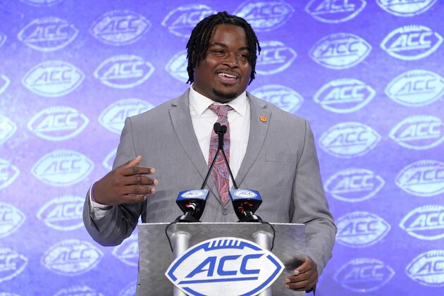 Clemson's John Simpson speaks during the Atlantic Coast Conference NCAA college football media day in Charlotte, N.C., Wednesday, July 17, 2019. (AP Photo/Chuck Burton)