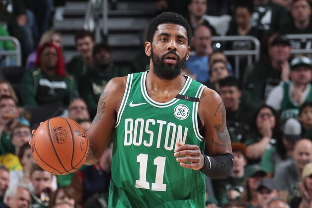 MILWAUKEE, WI - MAY 8:  Kyrie Irving #11 of the Boston Celtics brings the ball up the court during Game Five of the Eastern Conference Semifinals of the 2019 NBA Playoffs against the Milwaukee Bucks on May 8, 2019 at the Fiserv Forum in Milwaukee, Wisconsin. NOTE TO USER: User expressly acknowledges and agrees that, by downloading and/or using this photograph, user is consenting to the terms and conditions of the Getty Images License Agreement. Mandatory Copyright Notice: Copyright 2019 NBAE (Photo by Nathaniel S. Butler/NBAE via Getty Images)