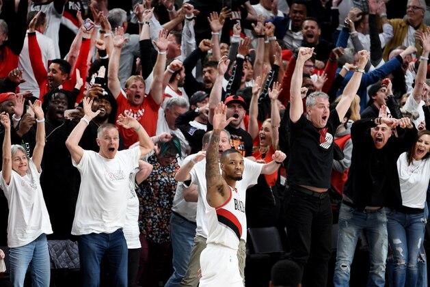 PORTLAND, OREGON - APRIL 23: Damian Lillard #0 of the Portland Trail Blazers waves goodbye to the Oklahoma City Thunder after hitting a last second 37 foot game winner to end Game Five of the Western Conference quarterfinals during the 2019 NBA Playoffs at Moda Center on April 23, 2019 in Portland, Oregon. The Blazers won 118-115.  NOTE TO USER: User expressly acknowledges and agrees that, by downloading and or using this photograph, User is consenting to the terms and conditions of the Getty Images License Agreement. (Photo by Steve Dykes/Getty Images)