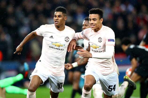 PARIS, FRANCE - MARCH 06: Marcus Rashford of Manchester United celebrates scoring his team's third goal with Mason Greenwood during the UEFA Champions League Round of 16 second leg match between Paris Saint Germain and Manchester United at Le Parc des Princes on March 6, 2019 in Paris, France. (Photo by Chloe Knott - Danehouse/Getty Images)