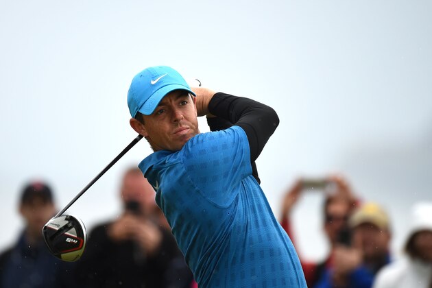 Northern Ireland's Rory McIlroy tees off from the 11th hole during the first round of the British Open golf Championships at Royal Portrush golf club in Northern Ireland on July 18, 2019. (Photo by ANDY BUCHANAN / AFP) / RESTRICTED TO EDITORIAL USE        (Photo credit should read ANDY BUCHANAN/AFP/Getty Images)