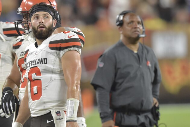 Cleveland Browns quarterback Baker Mayfield, left, and head coach Hue Jackson watch the video board in the second half of the team's NFL football preseason game against the Buffalo Bills, Friday, Aug. 17, 2018, in Cleveland. Buffalo won 19-17. (AP Photo/David Richard)