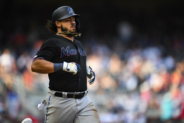 Miami Marlins' Jorge Alfaro runs to first base during a baseball game against the Atlanta Braves, Saturday, July 6, 2019, in Atlanta. Miami won 5-4.(AP Photo/John Amis)