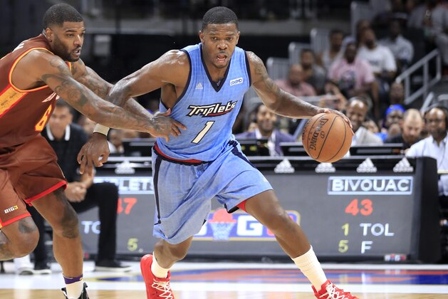 ATLANTA, GEORGIA - JULY 07: Joe Johnson #1 of Triplets drives past Josh Smith #6 of Bivouac during week three of the BIG3 three on three basketball league at State Farm Arena on July 07, 2019 in Atlanta, Georgia. (Photo by Andy Lyons/BIG3/Getty Images)