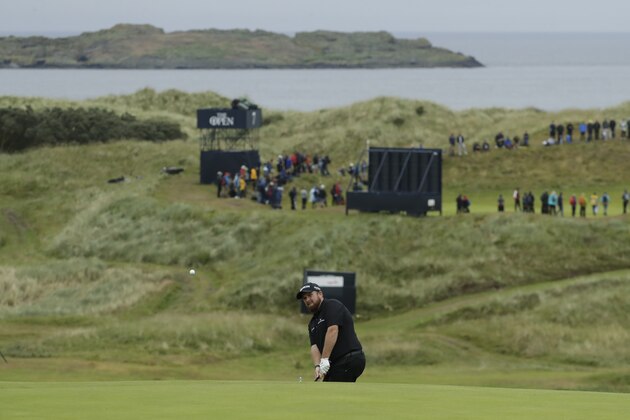 Ireland's Shane Lowry chips onto the 16th green during the second round of the British Open Golf Championships at Royal Portrush in Northern Ireland, Friday, July 19, 2019.(AP Photo/Matt Dunham)