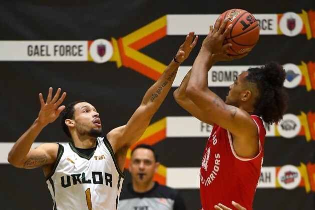 LOS ANGELES, CA - JULY 13:  Jamal Camilo #1 of the Utah Valor defends a shot by Buddha Boyd #10 of the Fort Hood Wounded Warriors  as he goes for a basket in the West Regional of The Basketball Tournament (TBT) at Eagle's Nest Arena on July 13, 2018 in Los Angeles, California.  (Photo by Jayne Kamin-Oncea/Getty Images)