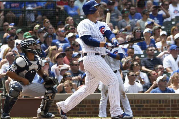 Chicago Cubs' Anthony Rizzo (44) watches his grand slam home run against the San Diego Padres during the third inning of a baseball game, Friday, July,19, 2019, in Chicago. (AP Photo/David Banks)