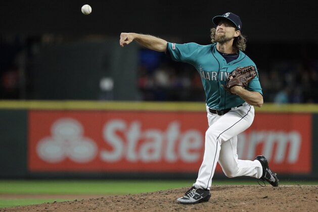 Seattle Mariners starting pitcher Mike Leake throws to a Los Angeles Angels batter during the seventh inning of a baseball game Friday, July 19, 2019, in Seattle. (AP Photo/Ted S. Warren)