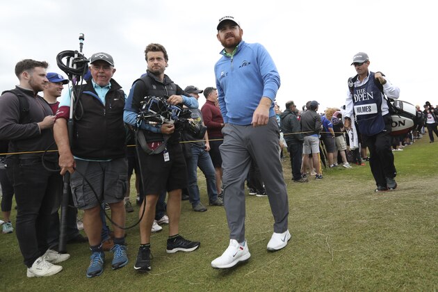 J.B. Holmes of the United States walks to the 17th tee during the second round of the British Open Golf Championships at Royal Portrush in Northern Ireland, Friday, July 19, 2019.(AP Photo/Jon Super)
