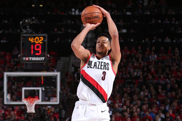PORTLAND, OR - MAY 20:  CJ McCollum #3 of the Portland Trail Blazers shoots the ball against the Golden State Warriors during Game Four of the Western Conference Finals on May 20, 2019 at the Moda Center in Portland, Oregon. NOTE TO USER: User expressly acknowledges and agrees that, by downloading and/or using this photograph, user is consenting to the terms and conditions of the Getty Images License Agreement. Mandatory Copyright Notice: Copyright 2019 NBAE (Photo by Sam Forencich/NBAE via Getty Images)