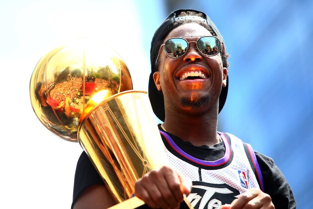 TORONTO, ON - JUNE 17:  Kyle Lowry #7 of the Toronto Raptors holds the championship trophy during the Toronto Raptors Victory Parade on June 17, 2019 in Toronto, Canada. The Toronto Raptors beat the Golden State Warriors 4-2 to win the 2019 NBA Finals.  NOTE TO USER: User expressly acknowledges and agrees that, by downloading and or using this photograph, User is consenting to the terms and conditions of the Getty Images License Agreement.  (Photo by Vaughn Ridley/Getty Images)
