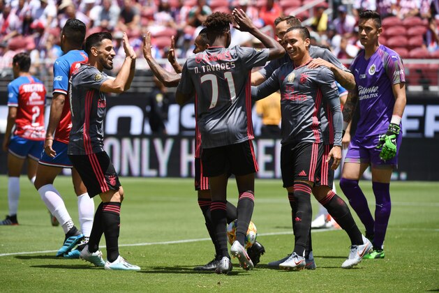 Benfica players celebrate after they scored against Chivas de Guadalajara during their 2019 International Champions Cup match at the Levi's Stadium in Santa Clara, California on July 20, 2019. (Photo by Mark RALSTON / AFP)        (Photo credit should read MARK RALSTON/AFP/Getty Images)