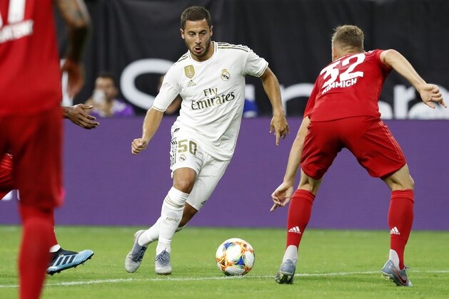 HOUSTON, TEXAS - JULY 20: Eden Hazard #50 of Real Madrid dribbles the ball against Bayern Munich in the 2019 International Champions Cup at NRG Stadium on July 20, 2019 in Houston, Texas. (Photo by Tim Warner/International Champions Cup/Getty Images)