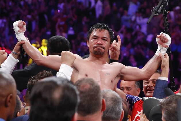 Manny Pacquiao reacts after defeating Keith Thurman by split decision in a welterweight title fight Saturday, July 20, 2019, in Las Vegas. (AP Photo/John Locher)