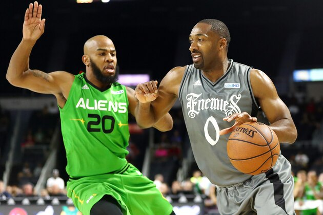 PROVIDENCE, RHODE ISLAND - JULY 13: Gilbert Arenas #0 of the Enemies dribbles against Andre Owens #20 of the Aliens during week four of the BIG3 three on three basketball league at Dunkin' Donuts Center on July 13, 2019 in Providence, Rhode Island. (Photo by Adam Glanzman/BIG3/Getty Images)