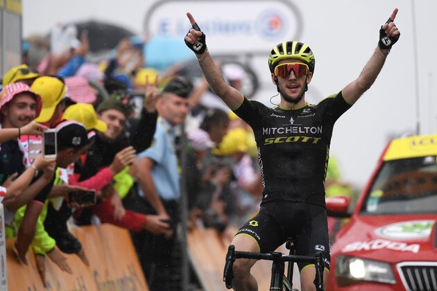 TOPSHOT - Great Britain's Simon Yates celebrates as he wins on the finish line of the fifteen stage of the 106th edition of the Tour de France cycling race between Limoux and Foix Prat d'Albis, in Foix Prat d'Albis on July 21, 2019. (Photo by JEFF PACHOUD / AFP)        (Photo credit should read JEFF PACHOUD/AFP/Getty Images)