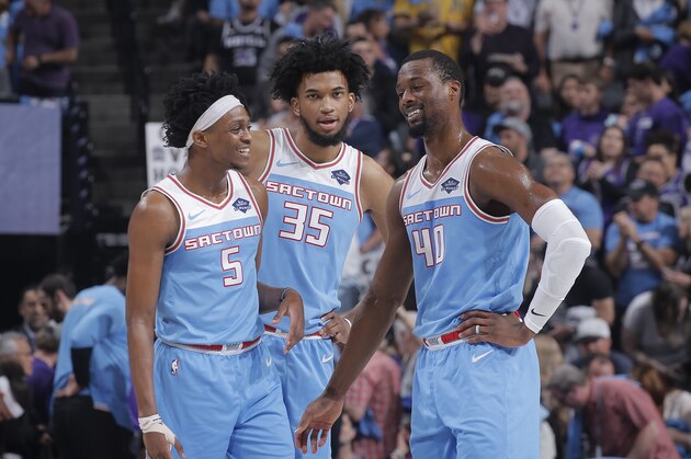SACRAMENTO, CA - APRIL 7: De'Aaron Fox #5, Marvin Bagley III #35, and Harrison Barnes #40 of the Sacramento Kings are seen together during the game against the New Orleans Pelicans on April 7, 2019 at Golden 1 Center in Sacramento, California. NOTE TO USER: User expressly acknowledges and agrees that, by downloading and or using this Photograph, user is consenting to the terms and conditions of the Getty Images License Agreement. Mandatory Copyright Notice: Copyright 2019 NBAE (Photo by Rocky Widner/NBAE via Getty Images)