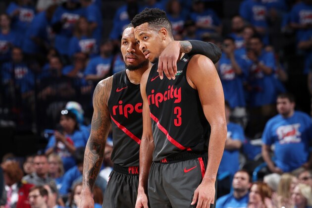 OKLAHOMA CITY, OK - APRIL 21: Damian Lillard #0 and CJ McCollum #3 of the Portland Trail Blazers look on during Game Four of Round One of the 2019 NBA Playoffs on April 21, 2019 at Chesapeake Energy Arena in Oklahoma City, Oklahoma. NOTE TO USER: User expressly acknowledges and agrees that, by downloading and/or using this photograph, user is consenting to the terms and conditions of the Getty Images License Agreement. Mandatory Copyright Notice: Copyright 2019 NBAE (Photo by Joe Murphy/NBAE via Getty Images)