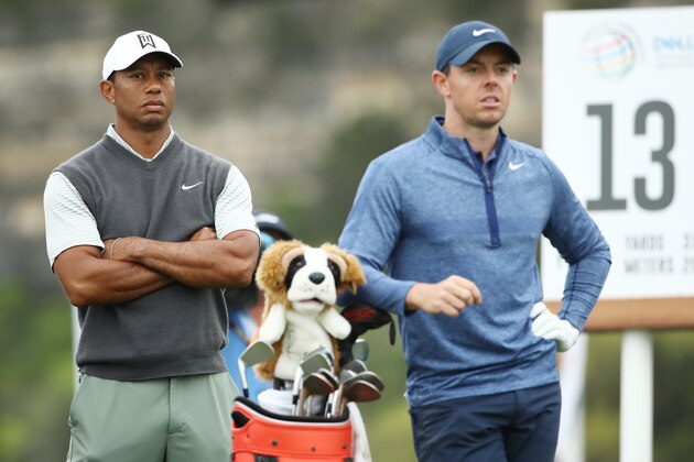 AUSTIN, TEXAS - MARCH 30: Tiger Woods of the United States and Rory McIlroy of Northern Ireland stand on the 13th tee during the fourth round of the World Golf Championships-Dell Technologies Match Play at Austin Country Club on March 30, 2019 in Austin, Texas. (Photo by Ezra Shaw/Getty Images)
