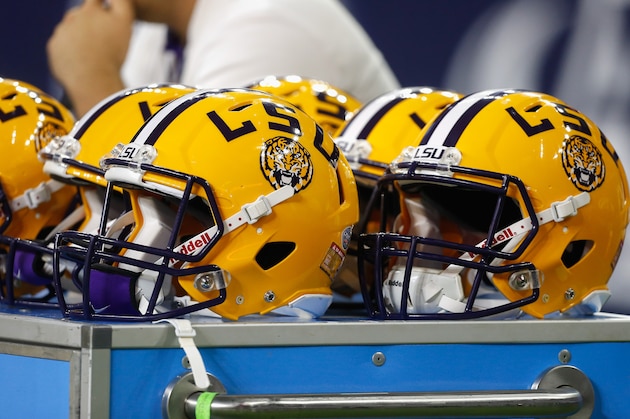 LSU helmets sit on the bench area during the Texas Bowl NCAA football game Tuesday, Dec. 29, 2015, in Houston. LSU won 56-27. (AP Photo/Bob Levey)