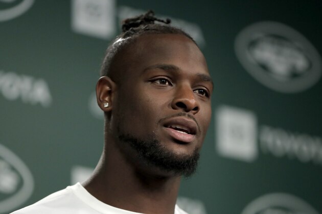 In this Tuesday,  June 4, 2019, photo, New York Jets running back Le'Veon Bell speaks to reporters at the team's NFL football training facility in Florham Park, N.J. Authorities say two female acquaintances stole more than half a million dollar in jewelry from Bell at his Florida home. (AP Photo/Julio Cortez)