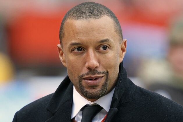 FILE - In this Nov. 19, 2017, file photo, Cleveland Browns vice president of football operations, Sashi Brown, watches before an NFL football game between the Jacksonville Jaguars and the Browns in Cleveland. A person familiar with the decisions says the Cleveland Browns have fired Sashi Brown. Brown, who was named the team’s top executive by owners Dee and Jimmy Haslam during an overhaul following the 2015 season, was relieved of his duties on Thursday, Dec. 7, 2017, said the person who spoke to the Associated Press on condition of anonymity because the team has not announced the move. (AP Photo/Ron Schwane, File)