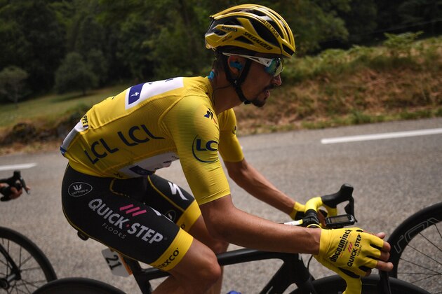 France's Julian Alaphilippe, wearing the overall leader's yellow jersey rides during the fifteen stage of the 106th edition of the Tour de France cycling race between Limoux and Foix Prat d'Albis, in Foix Prat d'Albis on July 21, 2019. (Photo by Marco Bertorello / AFP)        (Photo credit should read MARCO BERTORELLO/AFP/Getty Images)