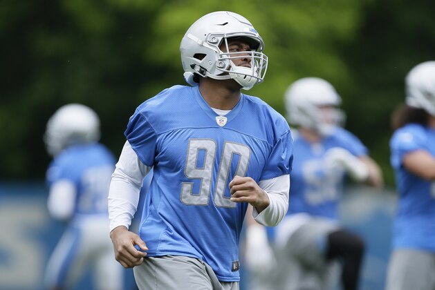 Detroit Lions defensive end Trey Flowers (90) performs crossovers during NFL football training camp Wednesday, June 5, 2019, in Allen Park, Mich. (AP Photo/Duane Burleson)