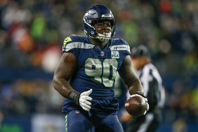 SEATTLE, WA - DECEMBER 23:  Defensive tackle Jarran Reed #90 of the Seattle Seahawks reacts after recovering a fumble against the Kansas City Chiefs at CenturyLink Field on December 23, 2018 in Seattle, Washington.  (Photo by Otto Greule Jr/Getty Images)