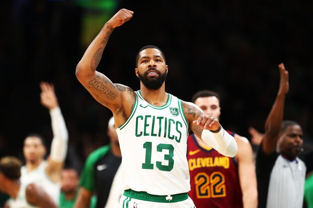 BOSTON, MA - NOVEMBER 30:  Marcus Morris #13 of the Boston Celtics reacts after hitting a three-point shot as the buzzer expired at the end of the second quarter of a game against the Cleveland Cavaliers at TD Garden on November 30, 2018 in Boston, Massachusetts. NOTE TO USER: User expressly acknowledges and agrees that, by downloading and or using this photograph, User is consenting to the terms and conditions of the Getty Images License Agreement. (Photo by Adam Glanzman/Getty Images)