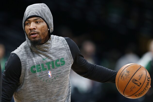 Boston Celtics' Marcus Smart warms up before Game 4 of a second round NBA basketball playoff series against the Milwaukee Bucks in Boston, Monday, May 6, 2019. (AP Photo/Michael Dwyer)