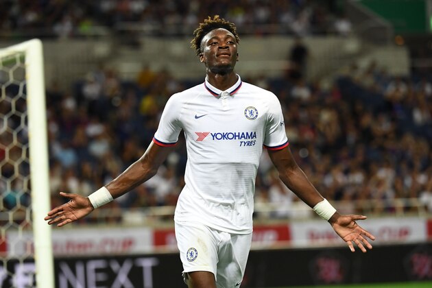Chelsea's forward Tammy Abraham celebrates after scoring a goal during a football friendly match between Spanish Liga team Barcelona and English Premier League club Chelsea in Saitama on July 23, 2019. (Photo by Toshifumi KITAMURA / AFP)        (Photo credit should read TOSHIFUMI KITAMURA/AFP/Getty Images)