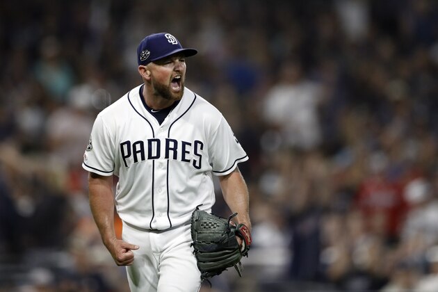 San Diego Padres relief pitcher Kirby Yates reacts after striking out Atlanta Braves' Freddie Freeman during the ninth inning of a baseball game Saturday, July 13, 2019, in San Diego. (AP Photo/Gregory Bull)