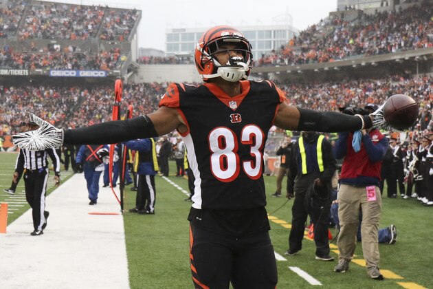 Cincinnati Bengals wide receiver Tyler Boyd celebrates after scoring a touchdown in the first half of an NFL football game against the Pittsburgh Steelers, Sunday, Oct. 14, 2018, in Cincinnati. (AP Photo/Gary Landers)