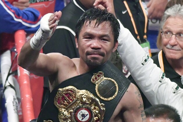 LAS VEGAS, NEVADA - JULY 20. Manny Pacquiao waves to his fans after going 12 rounds with Keith Thurman during their fight for the WBA welterweight title fight at MGM Grand Garden Arena on July 20, 2019 in Las Vegas, Nevada. Pacquiao took the win by a split decision.