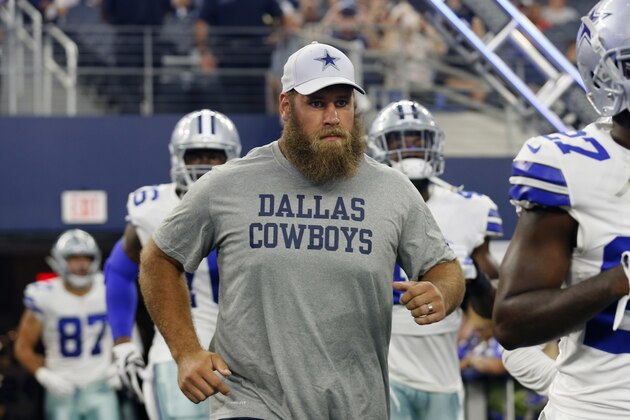 Dallas Cowboys center Travis Frederick runs onto the field before a preseason NFL Football game against the Cincinnati Bengals in Arlington, Texas, Saturday, Aug. 18, 2018. (AP Photo/Roger Steinman)