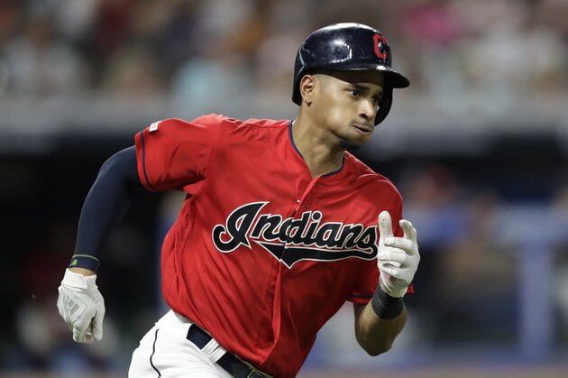 Cleveland Indians' Oscar Mercado runs to first base after hitting an RBI-single in the sixth inning of a baseball game, Friday, July 19, 2019, in Cleveland. (AP Photo/Tony Dejak)