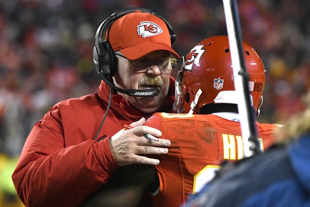 Kansas City Chiefs head coach Andy Reid congratulates wide receiver Tyreek Hill (10) after he scored a touchdown on a 78-yard kickoff return during the first half of an NFL football game against the Oakland Raiders in Kansas City, Mo., Thursday, Dec. 8, 2016. (AP Photo/Ed Zurga)