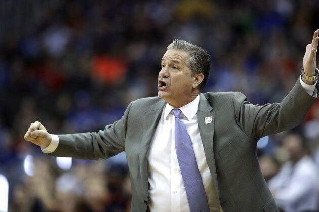 Kentucky head coach John Calipari yells to his players during the first half of the Midwest Regional final game against Auburn in the NCAA men's college basketball tournament Sunday, March 31, 2019, in Kansas City, Mo. (AP Photo/Charlie Riedel)