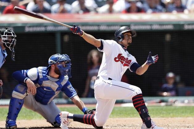 Cleveland Indians' Francisco Lindor watches his ball after hitting a two-run home run in the third inning of a baseball game against the Kansas City Royals, Sunday, July 21, 2019, in Cleveland. Royals catcher Cam Gallagher watches.  (AP Photo/Tony Dejak)