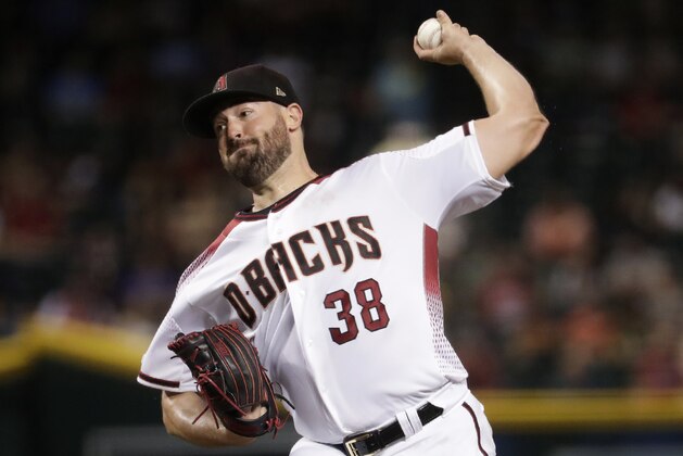 Arizona Diamondbacks starting pitcher Robbie Ray (38) throws against the Baltimore Orioles during the third inning of a baseball game, Monday, July 22, 2019, in Phoenix. (AP Photo/Matt York)