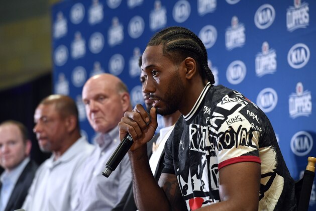 LOS ANGELES, CA - JULY 24: Kawhi Leonard speaks during his introductory news conference at Green Meadows Recreation Center on July 24, 2019 in Los Angeles, California. NOTE TO USER: User expressly acknowledges and agrees that, by downloading and or using this photograph, User is consenting to the terms and conditions of the Getty Images License Agreement. at Green Meadows Recreation Center on July 24, 2019 in Los Angeles, California. (Photo by Kevork Djansezian/Getty Images)