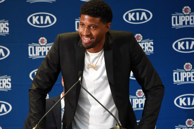 LOS ANGELES, CA - JULY 24: Paul George #13 of the LA Clippers smiles during a press conference at Green Meadows Recreation Center on July 24, 2019 in Los Angeles, California. NOTE TO USER: User expressly acknowledges and agrees that, by downloading and/or using this Photograph, user is consenting to the terms and conditions of the Getty Images License Agreement. Mandatory Copyright Notice: Copyright 2019 NBAE (Photo by Adam Pantozzi/NBAE via Getty Images)