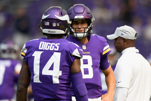 MINNEAPOLIS, MN - AUGUST 18: Stefon Diggs #14 and Kirk Cousins #8 of the Minnesota Vikings speak during warmups before the preseason game against the Jacksonville Jaguars on August 18, 2018 at US Bank Stadium in Minneapolis, Minnesota. (Photo by Hannah Foslien/Getty Images)