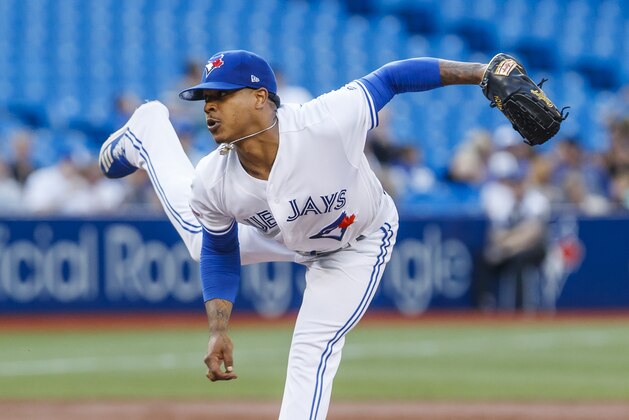 TORONTO, ONTARIO - JULY 24: Marcus Stroman #6 of the Toronto Blue Jays pitches against the Cleveland Indians in the third inning during their MLB game at the Rogers Centre on July 24, 2019 in Toronto, Canada. (Photo by Mark Blinch/Getty Images)