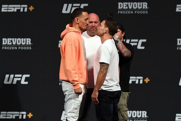 LAS VEGAS, NEVADA - JULY 05:  (L-R) Max Holloway and Frankie Edgar face off during the UFC seasonal press conference at T-Mobile Arena on July 5, 2019 in Las Vegas, Nevada. (Photo by Josh Hedges/Zuffa LLC/Zuffa LLC via Getty Images)
