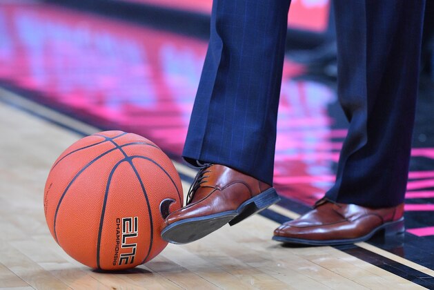 LAS VEGAS, NEVADA - DECEMBER 15:  Head coach Dave Rose of the Brigham Young Cougars stops a loose ball with his foot during his team's game against the UNLV Rebels at T-Mobile Arena on December 15, 2018 in Las Vegas, Nevada.  (Photo by Sam Wasson/Getty Images)